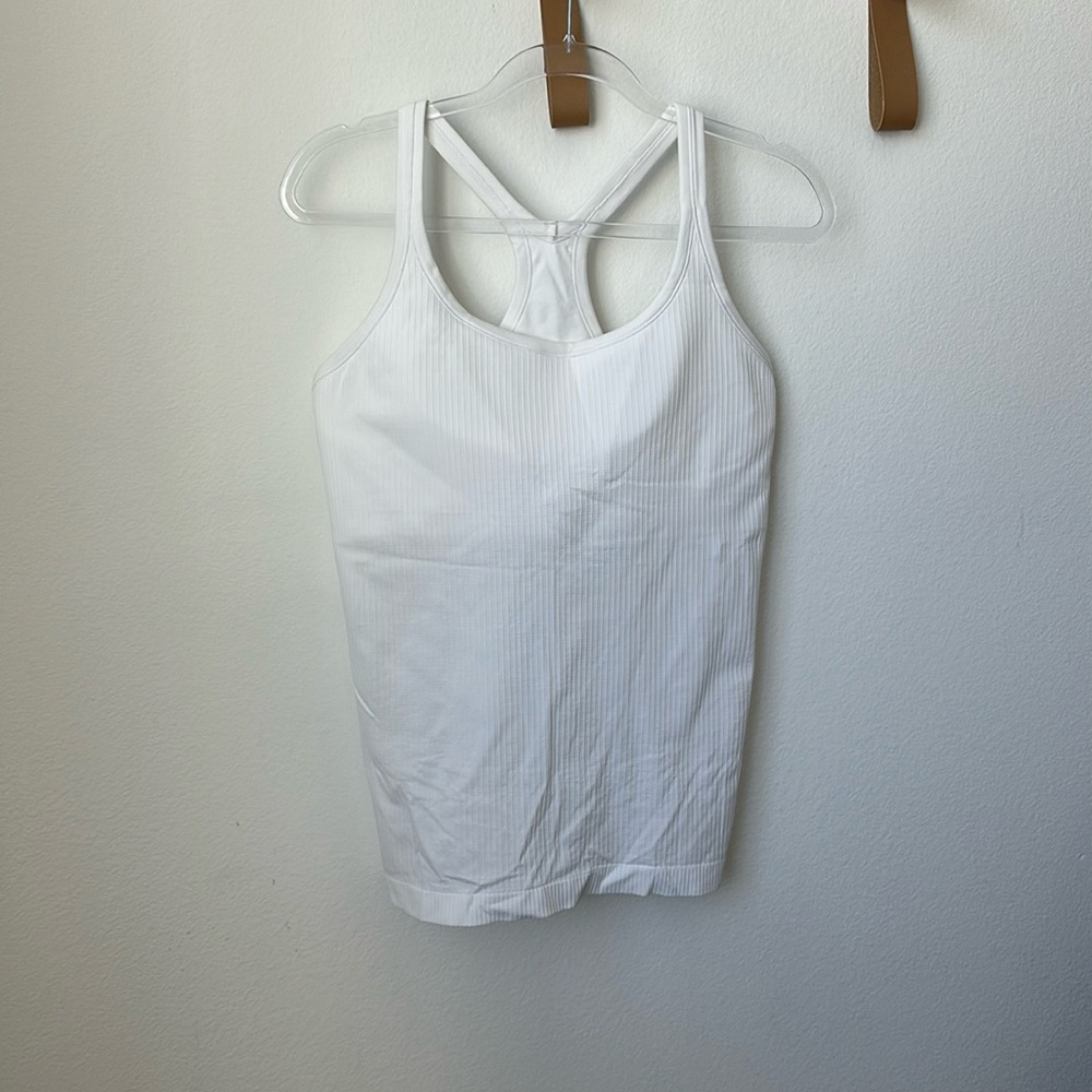 Lululemon Ebb to Street Tank with built in bra size 14 like new